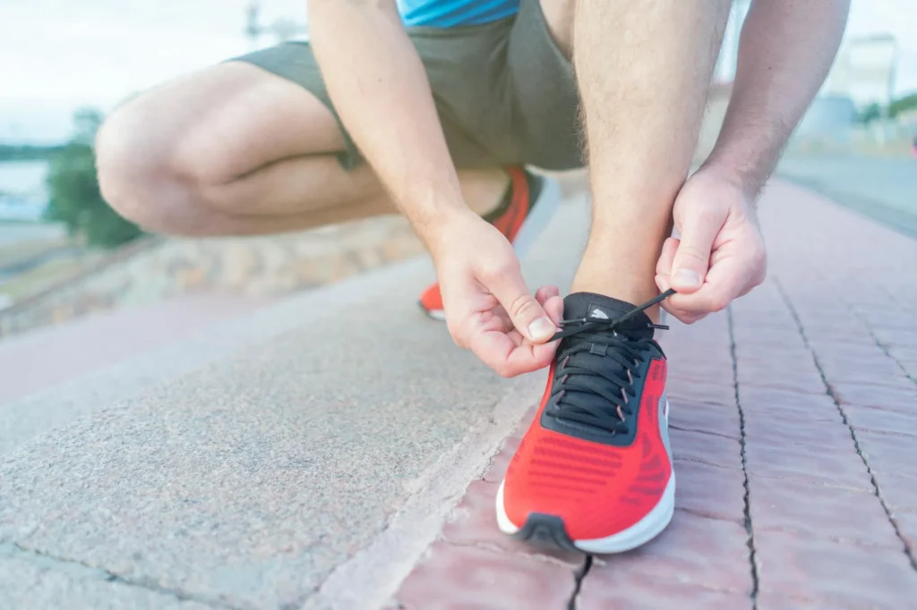 Modern running shoes ready for race day on a track