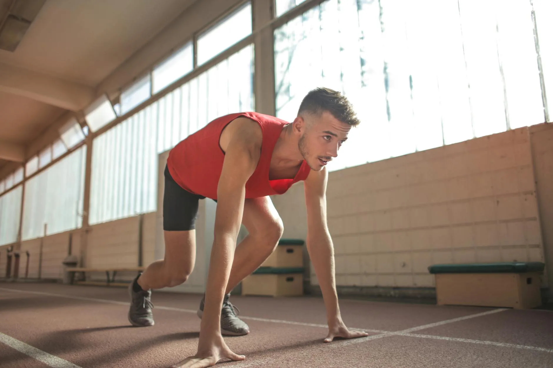 Runner preparing at the start line of a marathon race