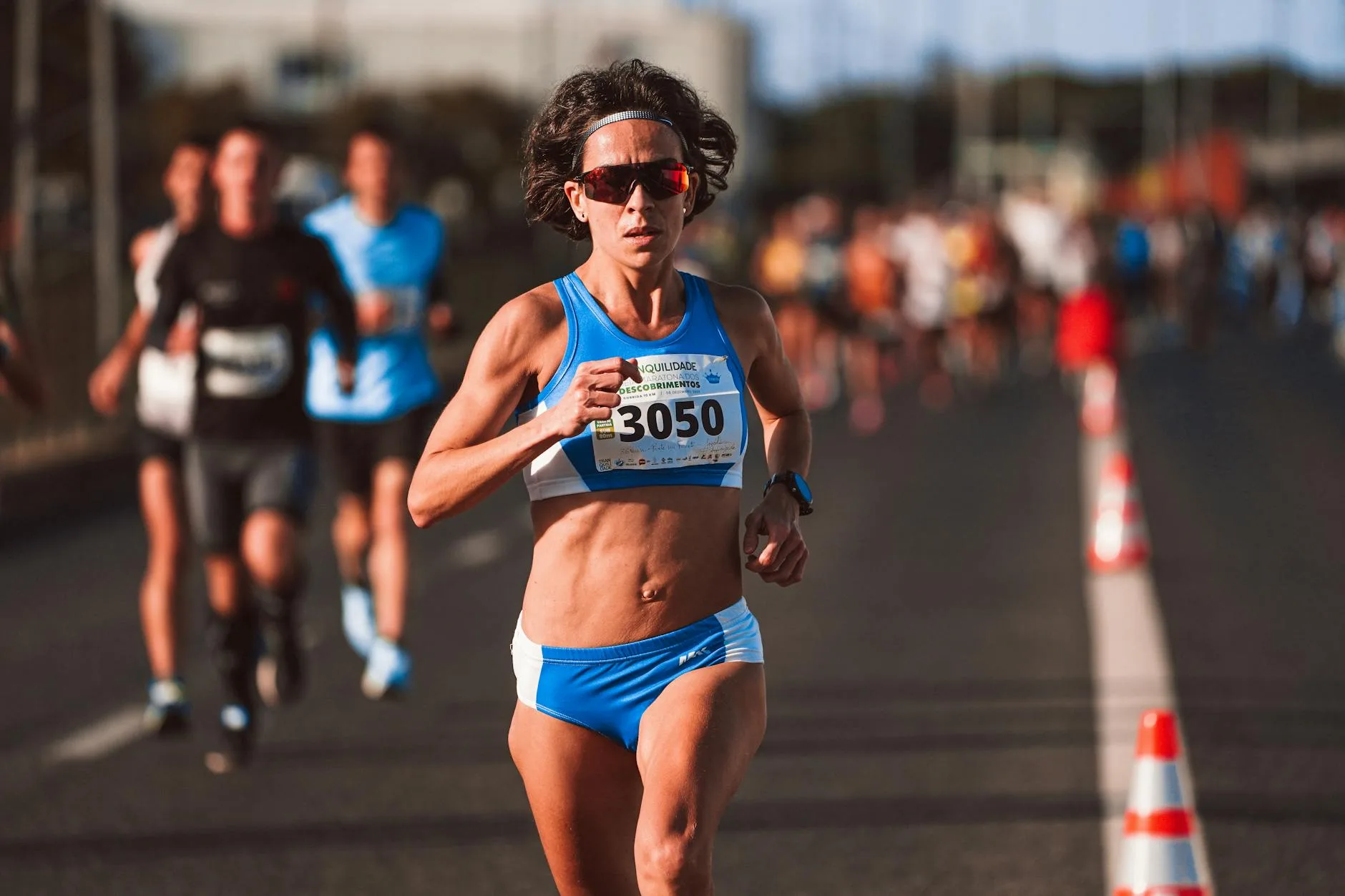 Runner competing in a road marathon race