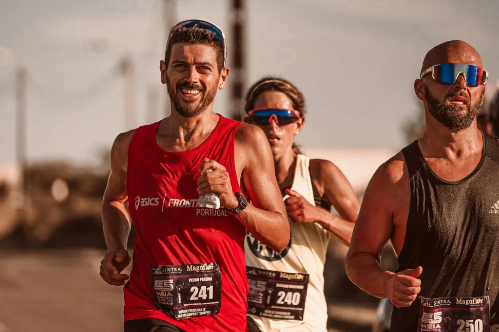 Runner holding an energy gel during a marathon race