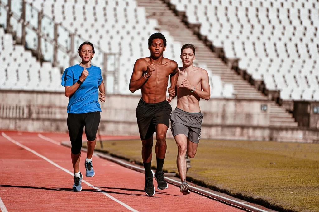 Runner sprinting on a track during interval training