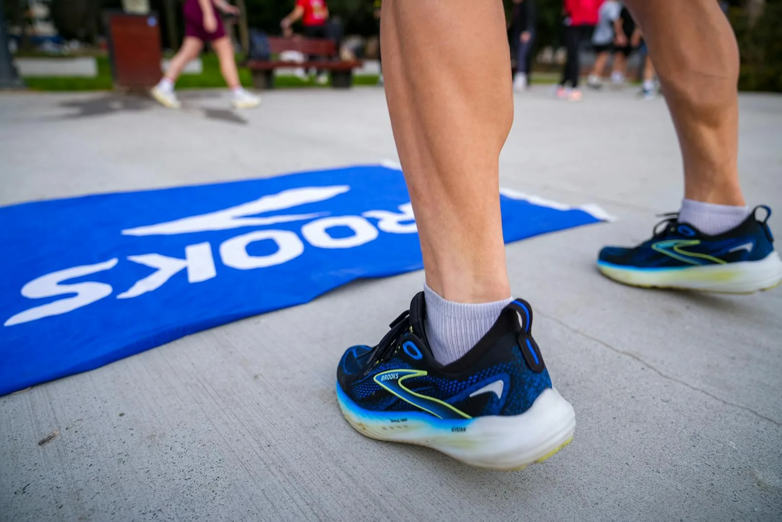 Close-up of running shoe midsole cushioning at a race event