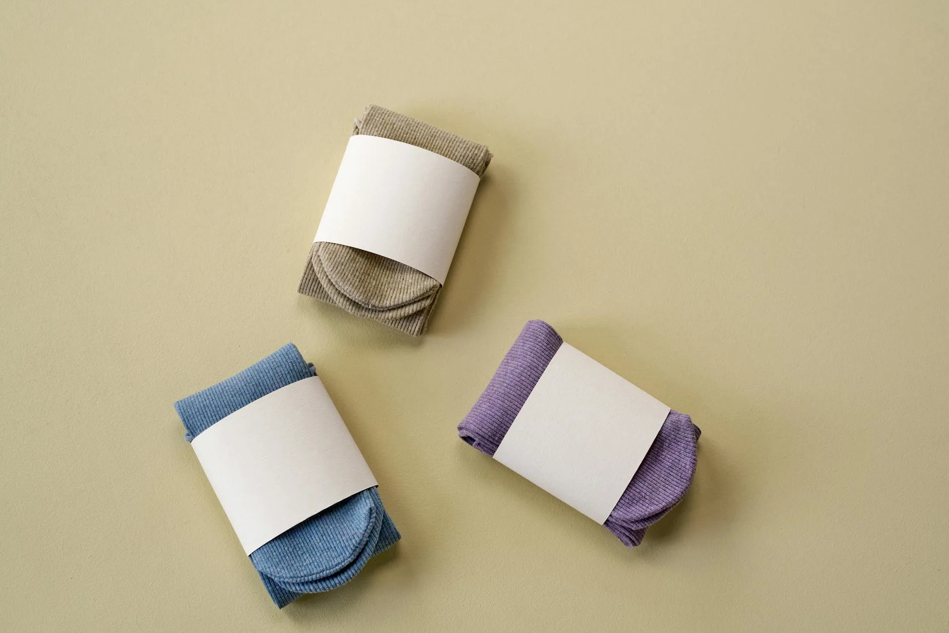 Selection of colourful running socks laid out showing different materials