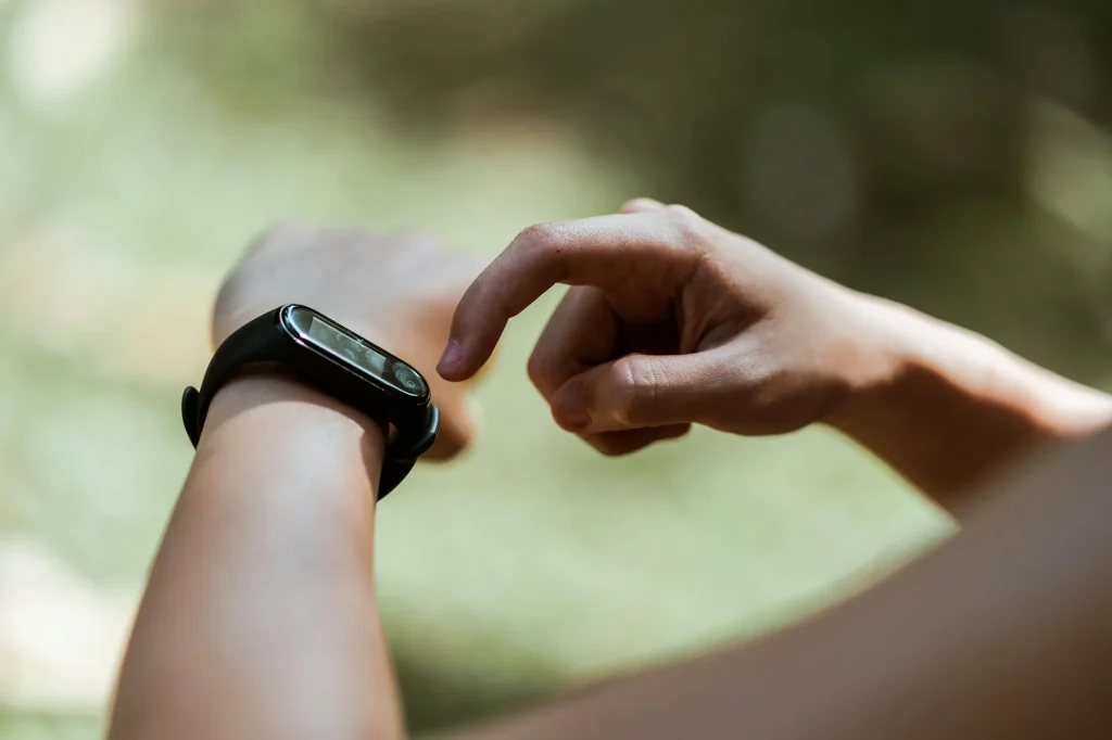 Runner checking their running watch during exercise