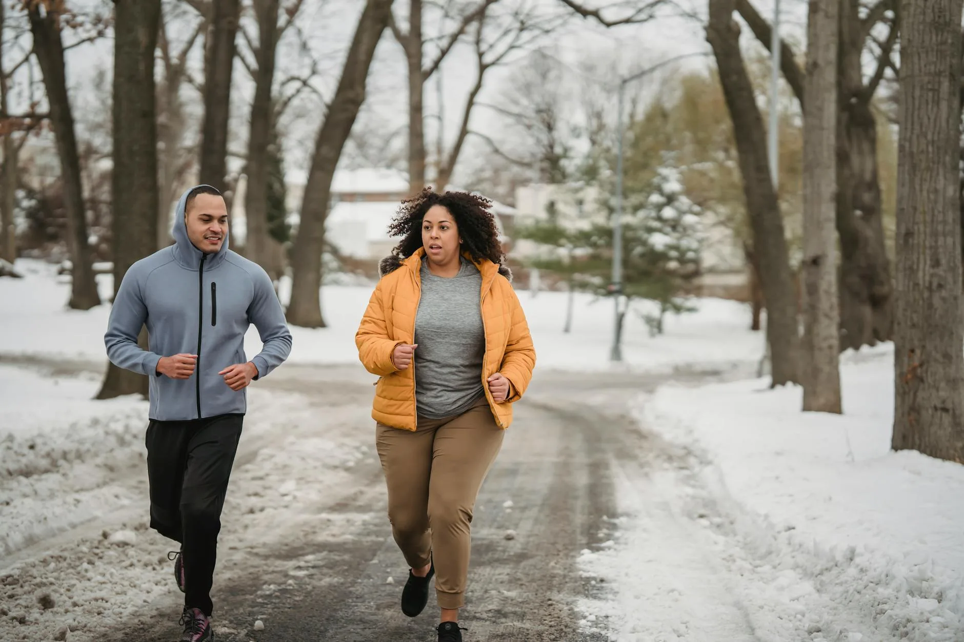 Runner wearing layered clothing during cold weather run