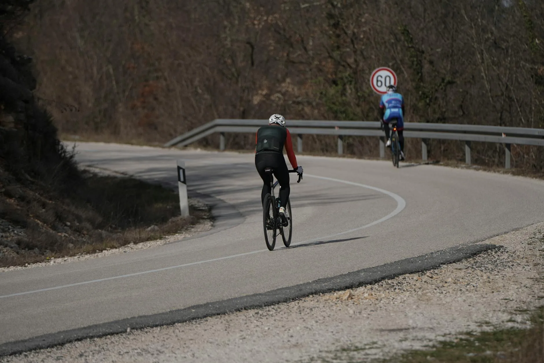 Cyclist riding a road bike outdoors as cross training