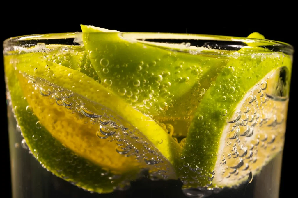 Fresh citrus electrolyte drink with lemon and lime slices