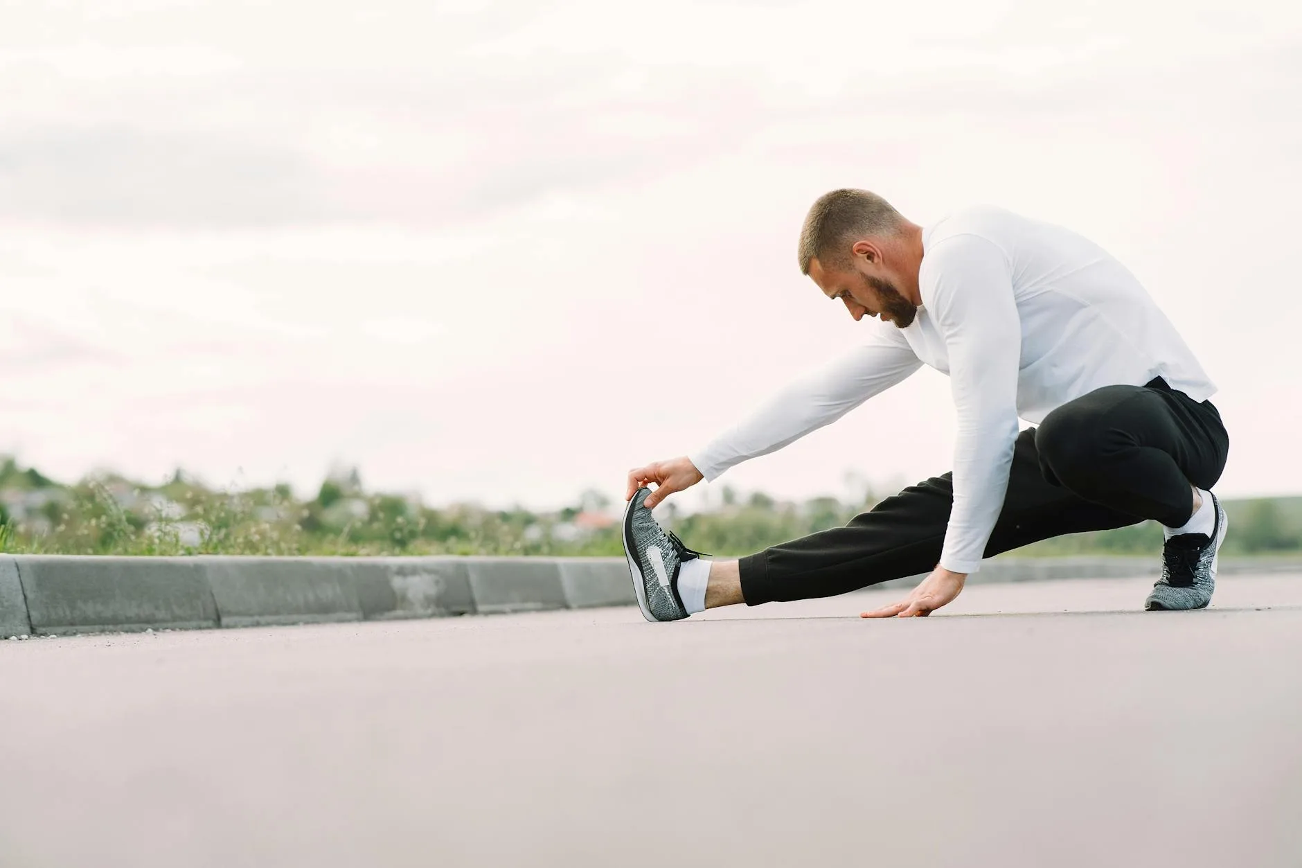 Runner stretching and warming up before an outdoor run