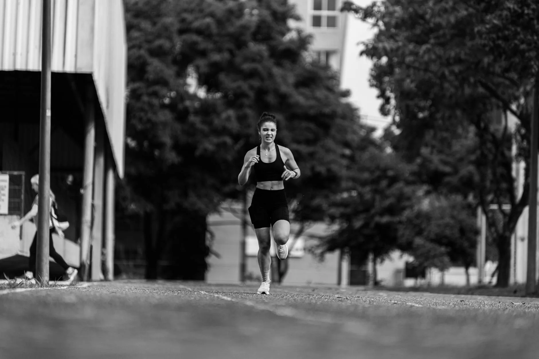 Runner checking their watch during a training session