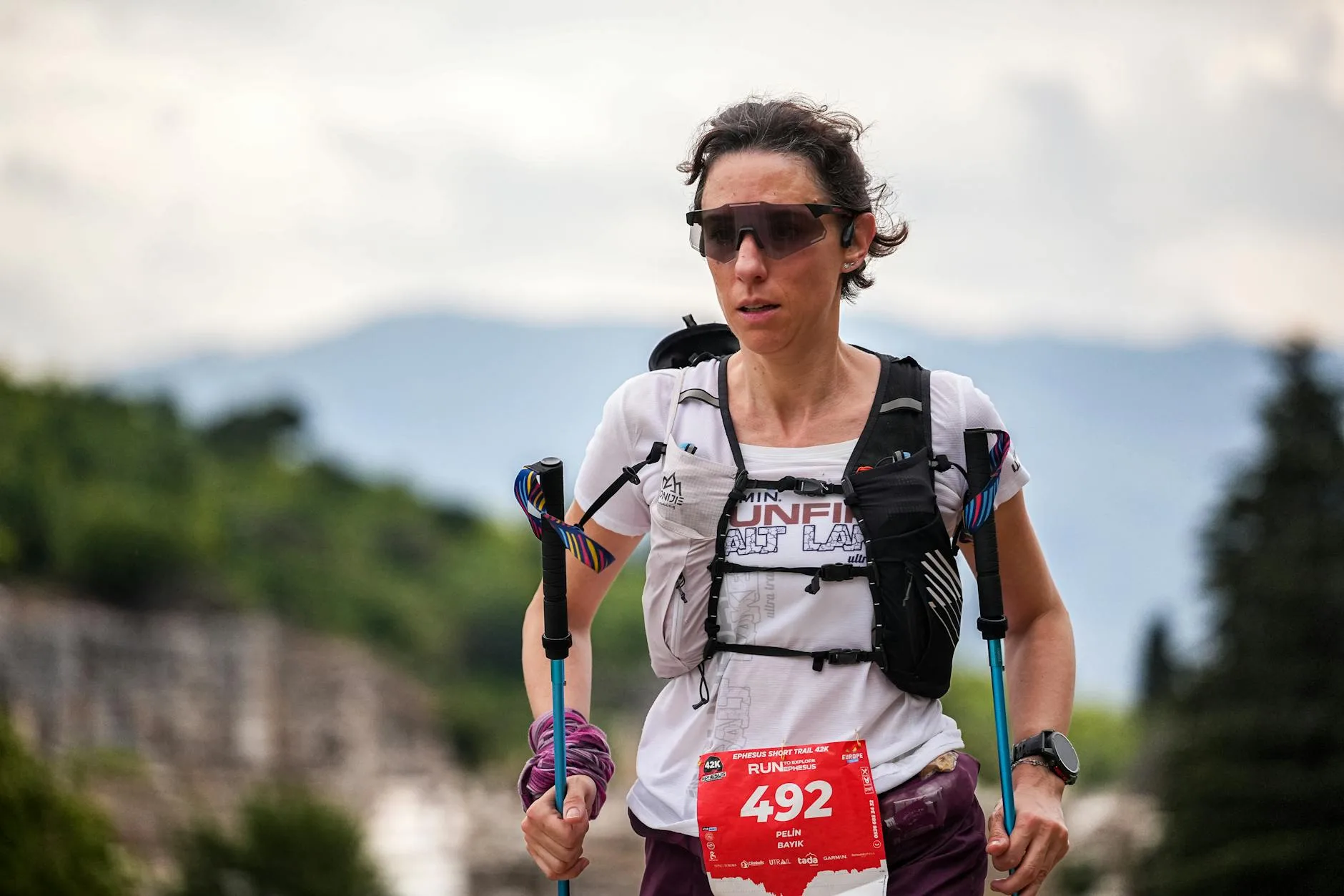 Solo trail runner on a mountain path