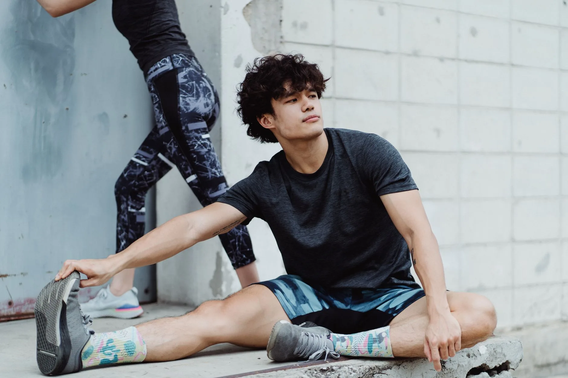 Runner stretching after a 10K training session