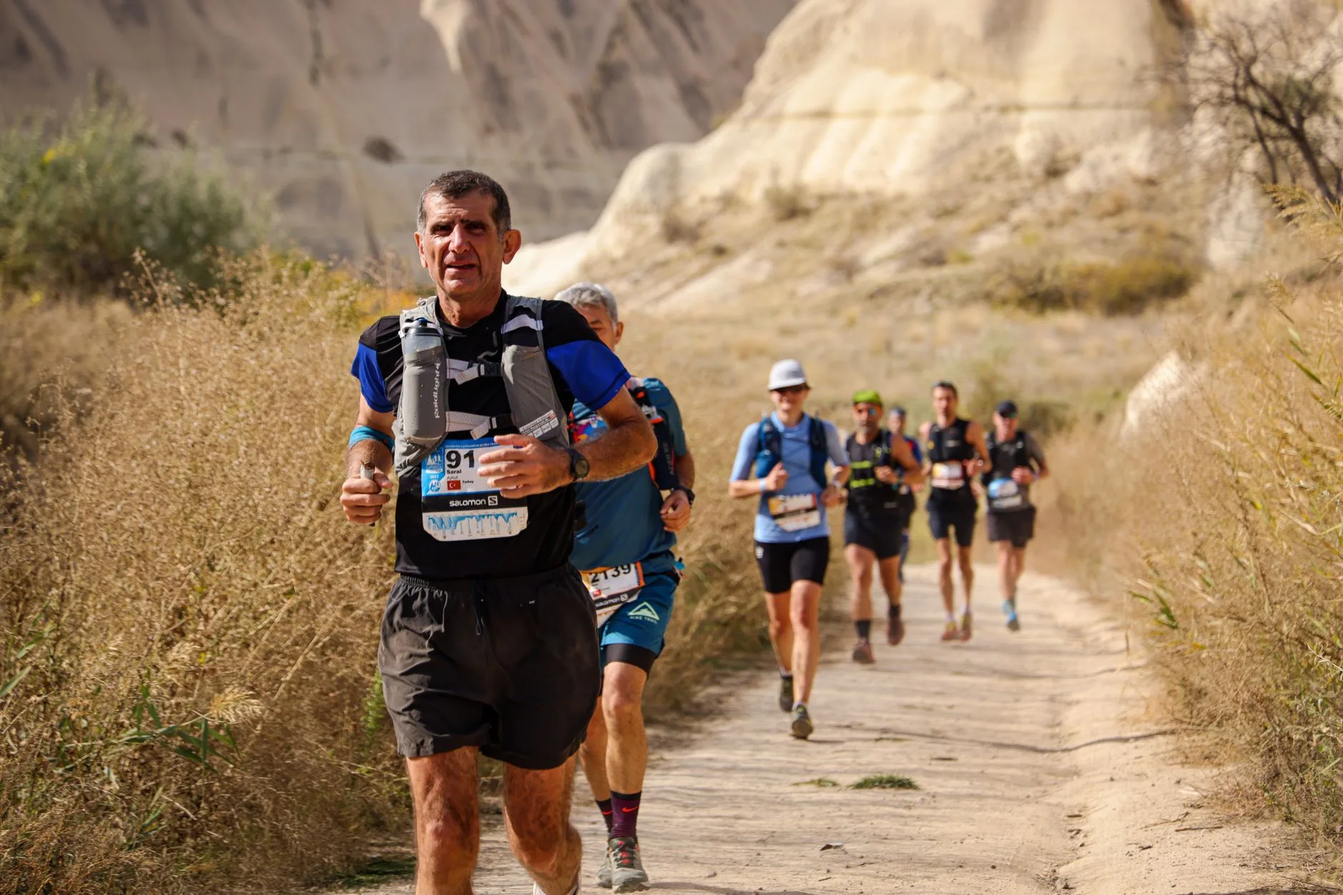 Long-distance runner on a warm road run
