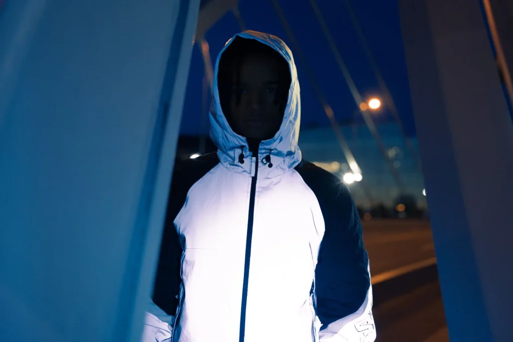 Runner wearing reflective gear during a dark evening run