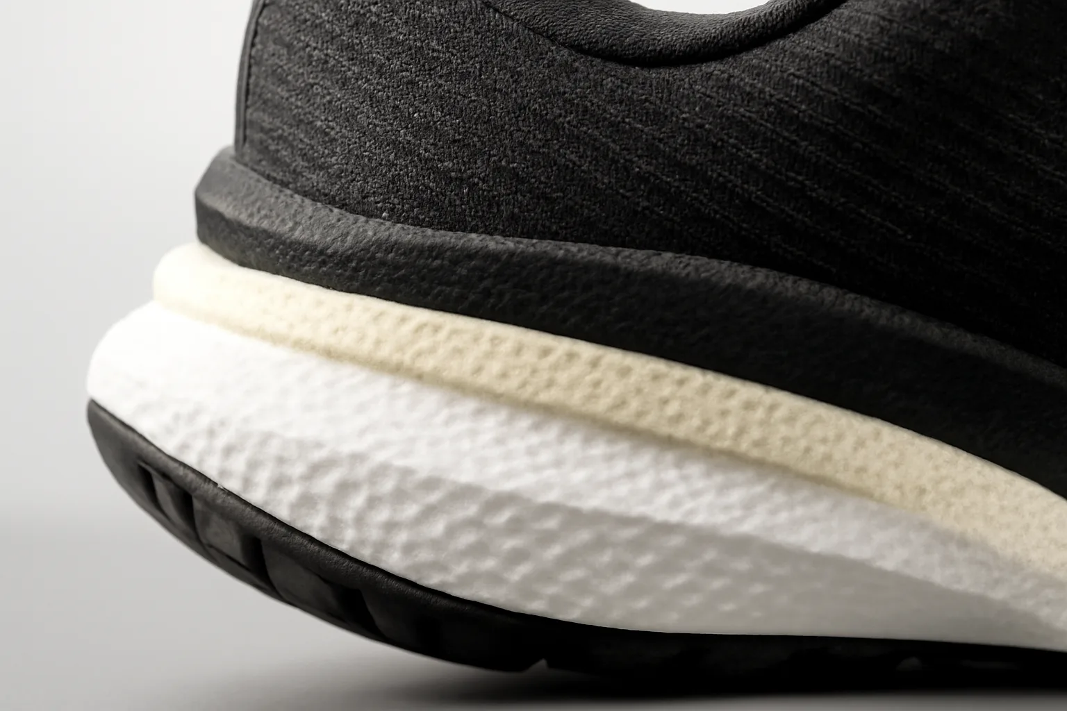Close up of running shoe midsole foam layers