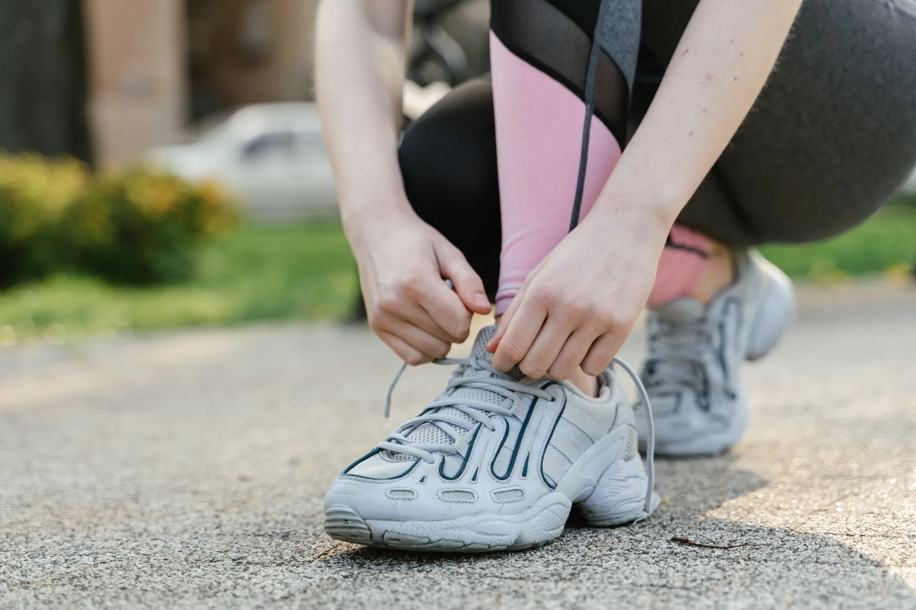 Running shoes on pavement during a form and surface check